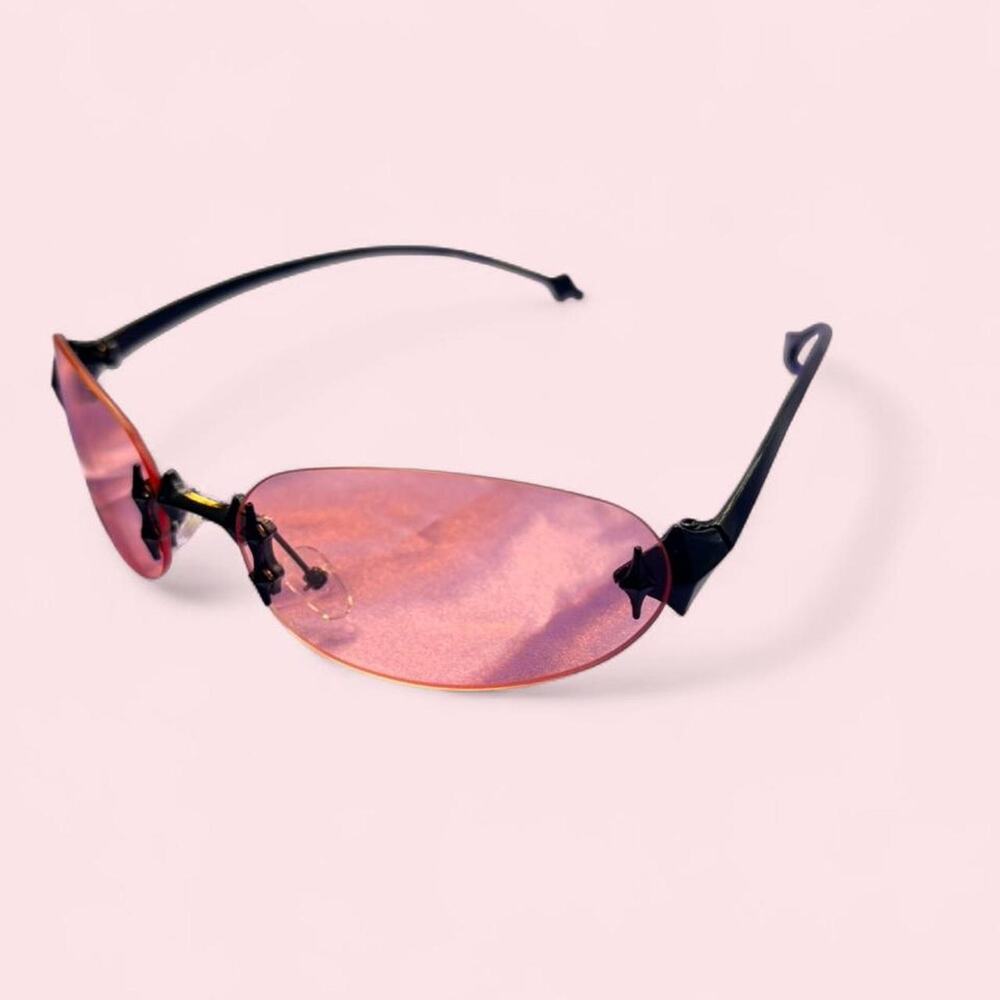 pink/ red rimless sunglasses black hardware edgy futuristic space goth alien y2k